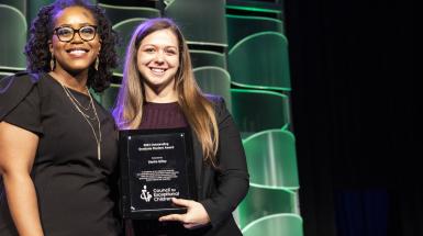 two people and award