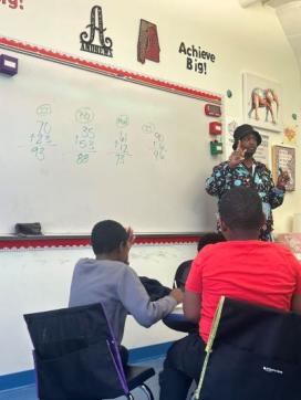 Kenyon Andrews teaching in his clasroom