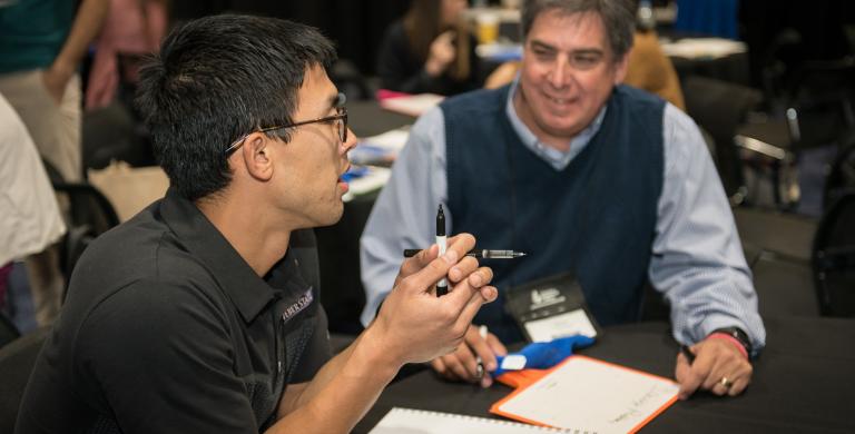 Two men having a discussion 